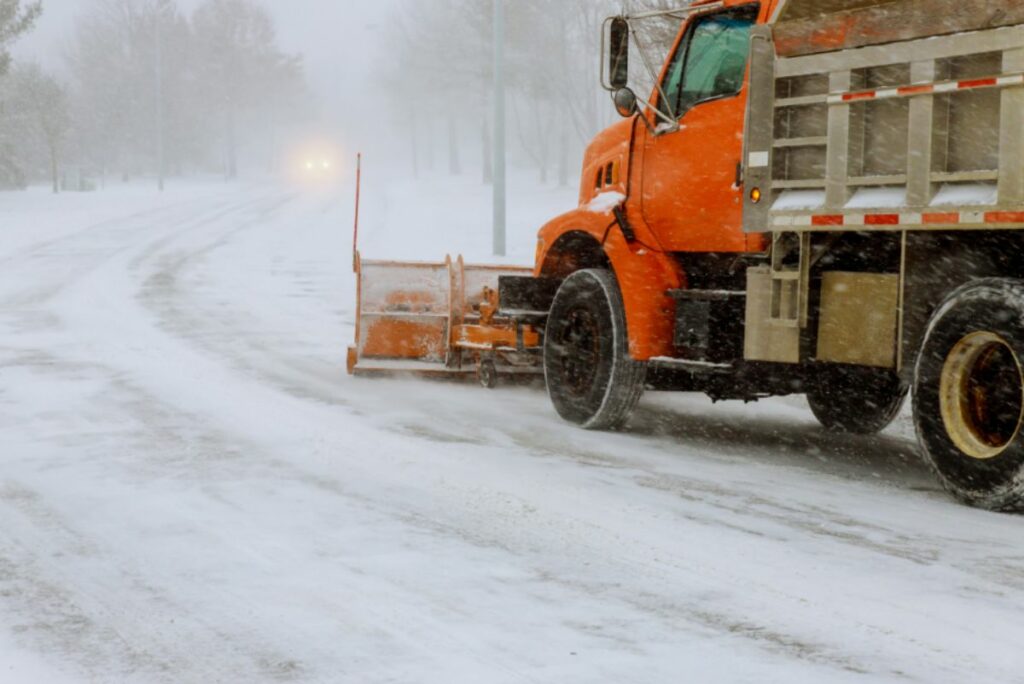 Truck plowing snow